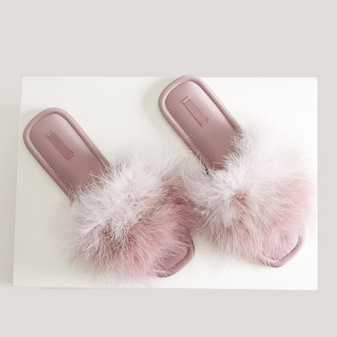 Pink feather slippers